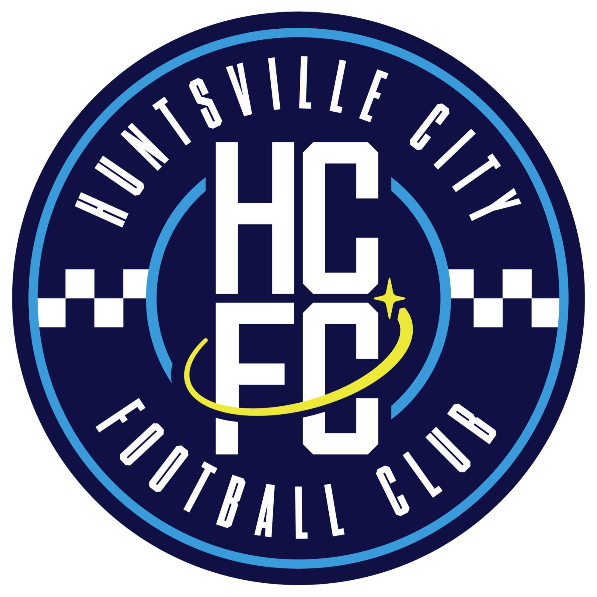 Circular Huntsville City Football Club logo with white text HCFC in the center, blue background, checker pattern accents, and a yellow swoosh with a star. White text encircles the badge.